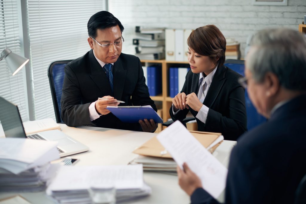 Lawyer and intern working together