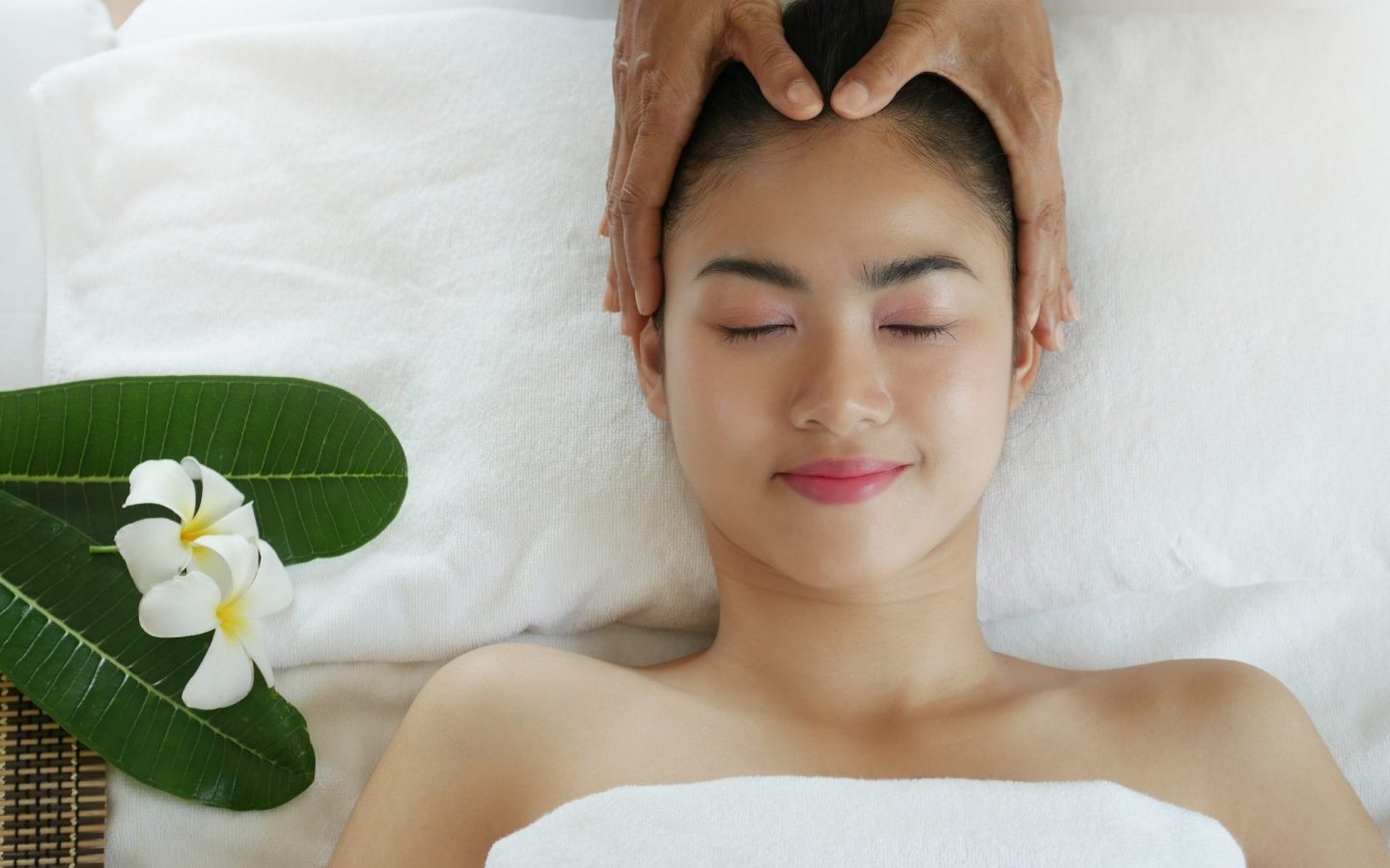Face massage in spa.
