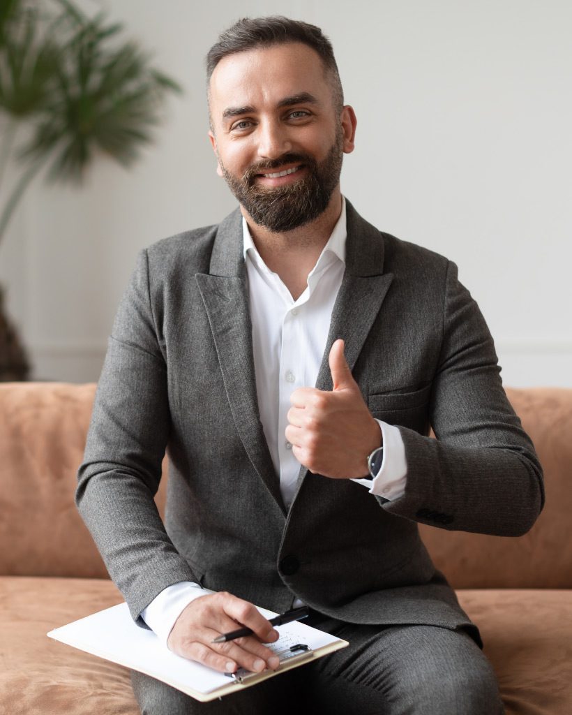 portrait-of-professional-male-therapist-in-suit-sh-LEUGTME
