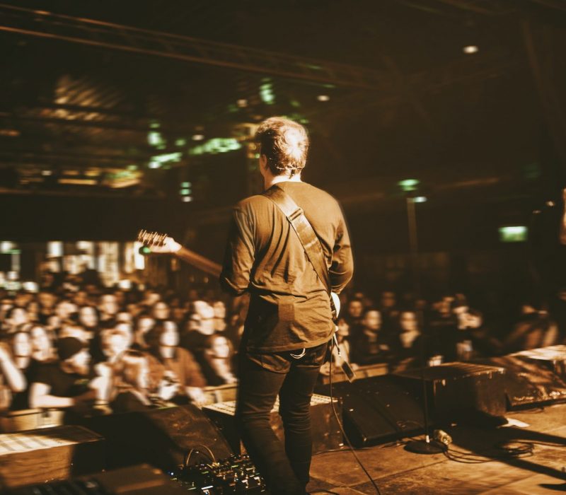 Guitarist playing in a concert