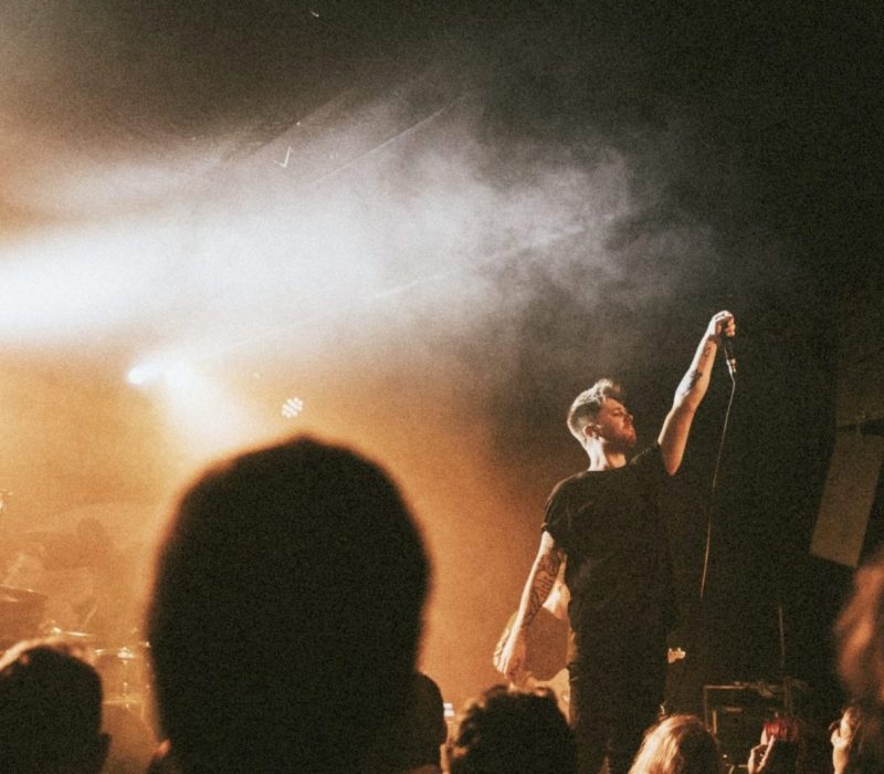 Rock band playing a concert at a live house in Europe