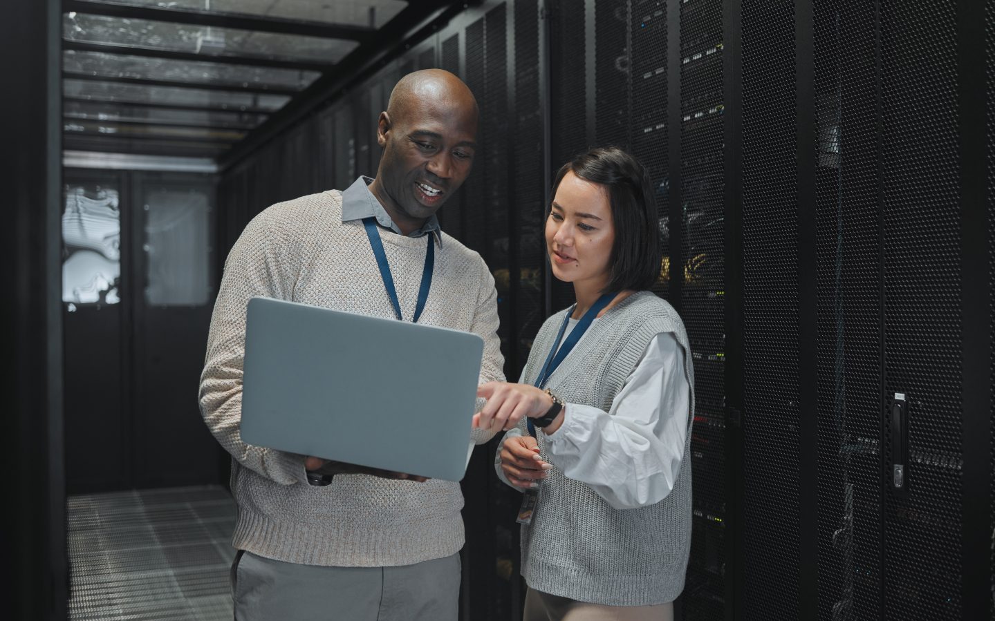 Business, black man and woman with laptop, servers and cyber security for connection, data analytic