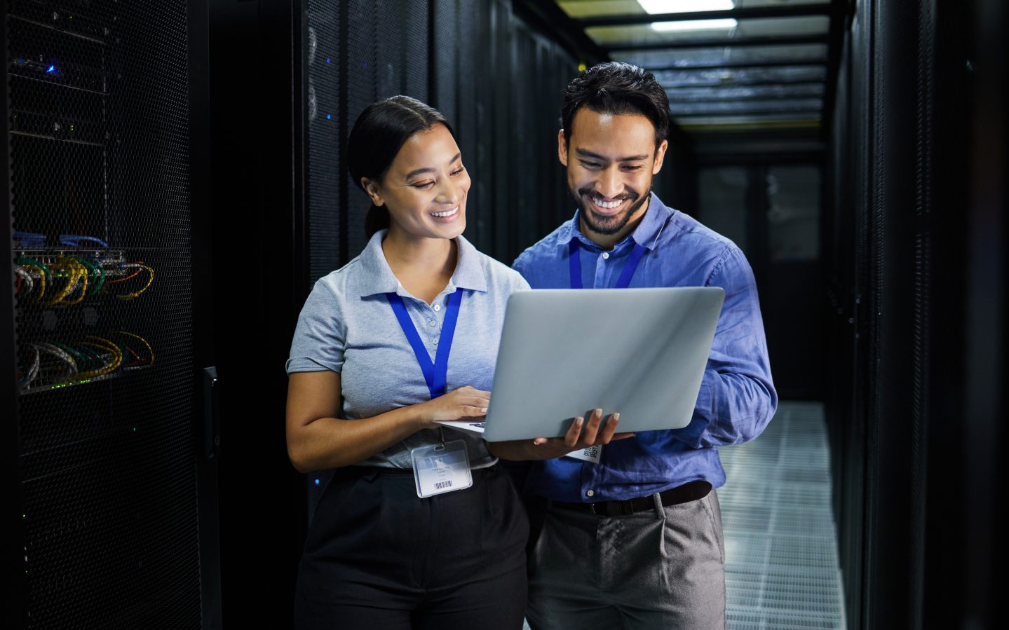 Server room, laptop and people team for software management, system upgrade and cyber security. Tea